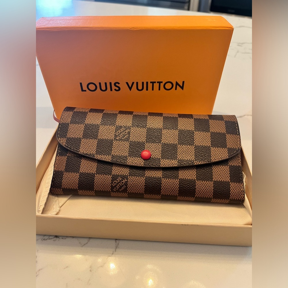 Brand New in box women’s large envelope wallet.